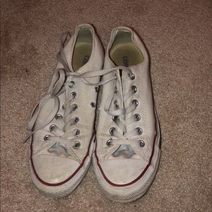 worn white low top converse